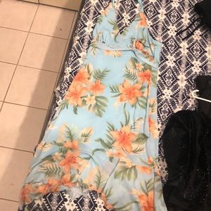 any size fits all 15+ womens dress. Blue base and orange flowers